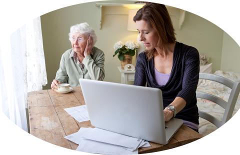 woman working with her mother at the same table