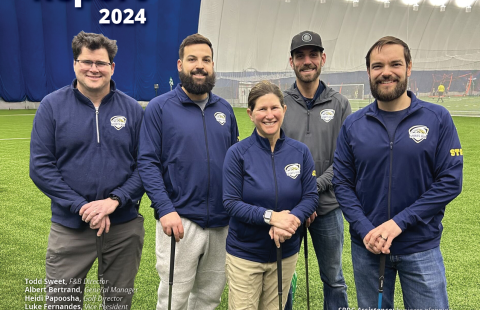 cover image 2024 impact report - with staff from New England Sports Hub