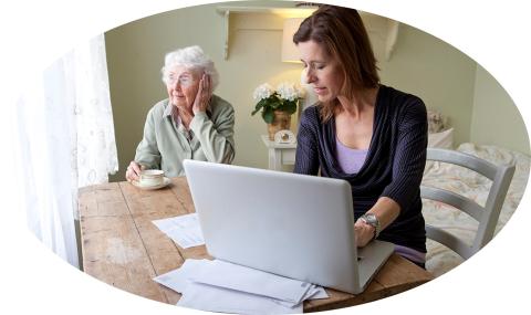 woman working with her mother at the same table